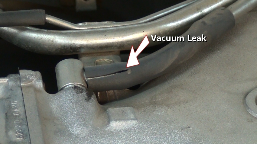 Exhaust leak in ford focus under the hood