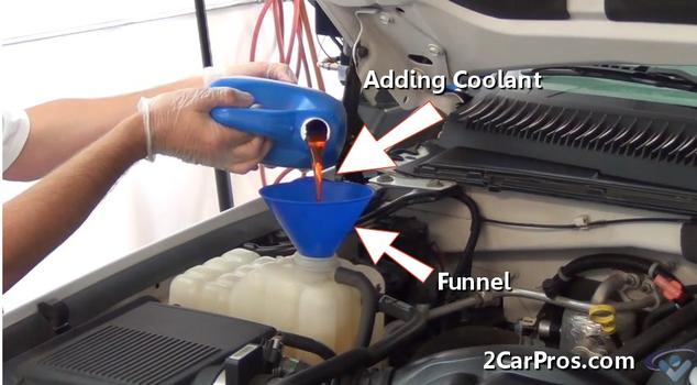 adding coolant to car