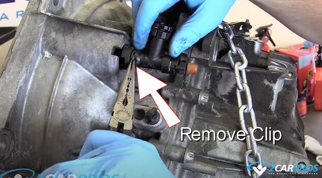 remove slave cylinder retainer clip