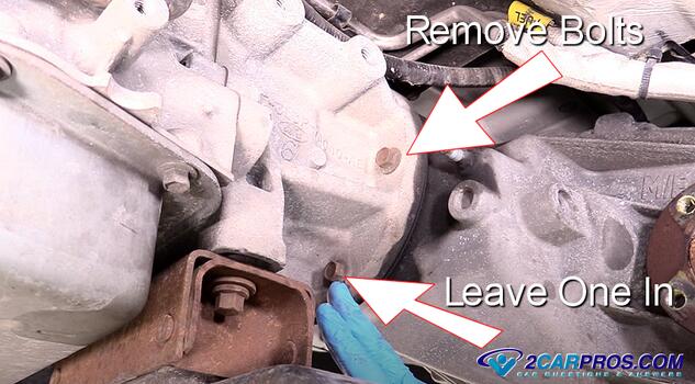 remove transfer case mounting bolts