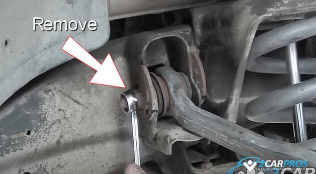 remove upper control arm frame bolt